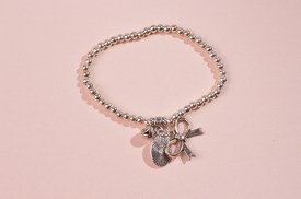 Pulsera metalica 3 dijes MOÑO (1).jpg
